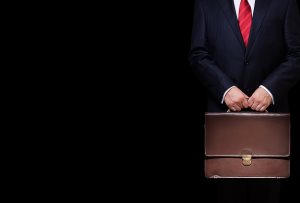 business person holding a briefcase